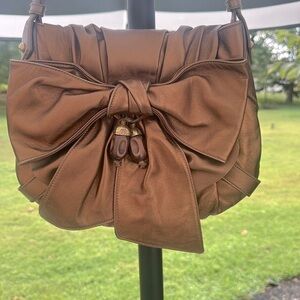 Yves saint Laurent  bag VINTAGE”  Elegant iridescent, copper Bow Accent